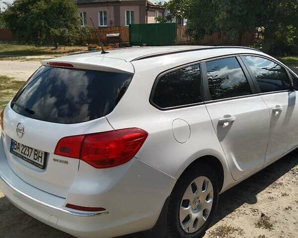 Белый Опель Астра, объемом двигателя 1.4 л и пробегом 76 тыс. км за 9600 $, фото 5 на Automoto.ua
