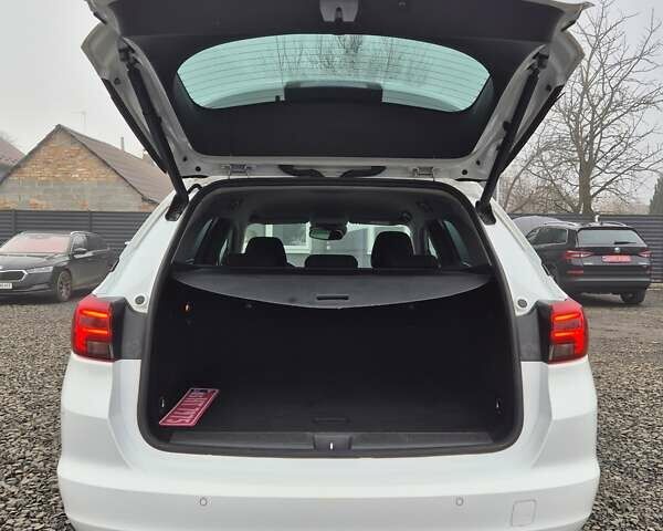 Білий Опель Астра, об'ємом двигуна 1.6 л та пробігом 182 тис. км за 12799 $, фото 14 на Automoto.ua