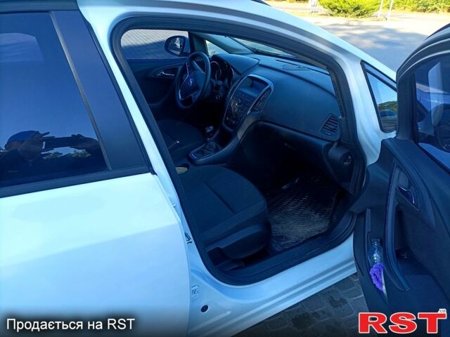 Белый Опель Астра, объемом двигателя 1.4 л и пробегом 76 тыс. км за 9600 $, фото 3 на Automoto.ua