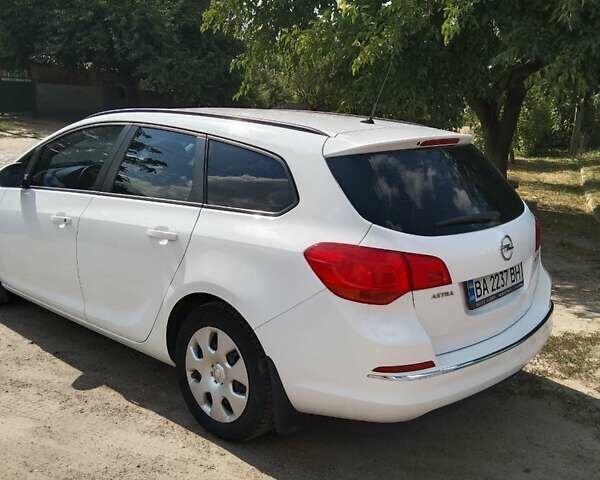 Белый Опель Астра, объемом двигателя 1.4 л и пробегом 76 тыс. км за 9600 $, фото 3 на Automoto.ua