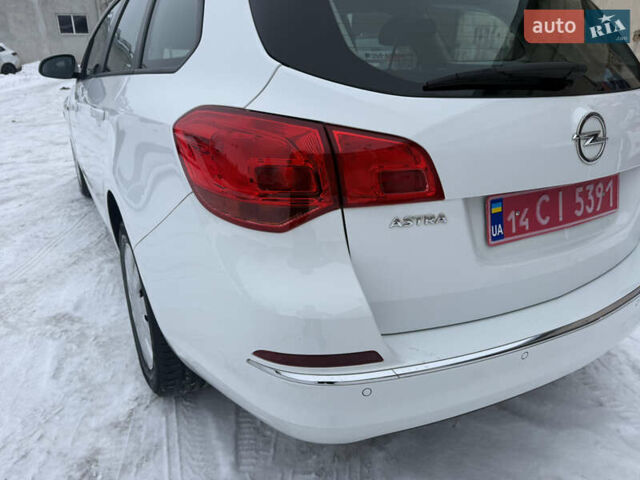 Белый Опель Астра, объемом двигателя 1.6 л и пробегом 198 тыс. км за 7500 $, фото 13 на Automoto.ua