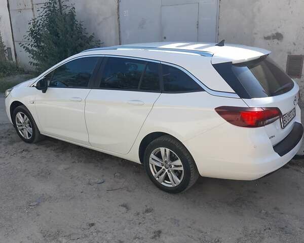 Білий Опель Астра, об'ємом двигуна 1.6 л та пробігом 212 тис. км за 10000 $, фото 12 на Automoto.ua