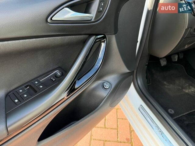 Білий Опель Астра, об'ємом двигуна 1.6 л та пробігом 217 тис. км за 12700 $, фото 19 на Automoto.ua