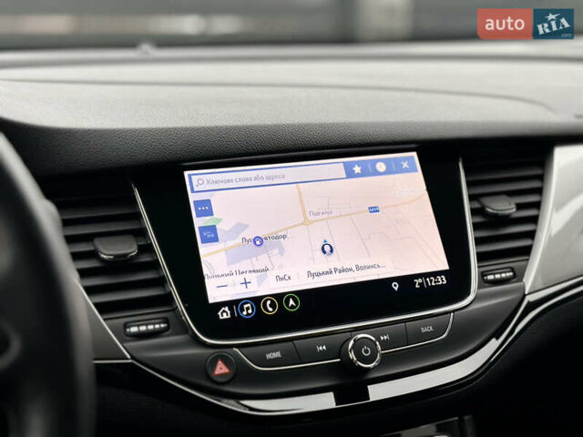Белый Опель Астра, объемом двигателя 1.5 л и пробегом 127 тыс. км за 14699 $, фото 48 на Automoto.ua