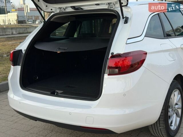 Білий Опель Астра, об'ємом двигуна 1.5 л та пробігом 124 тис. км за 13900 $, фото 39 на Automoto.ua
