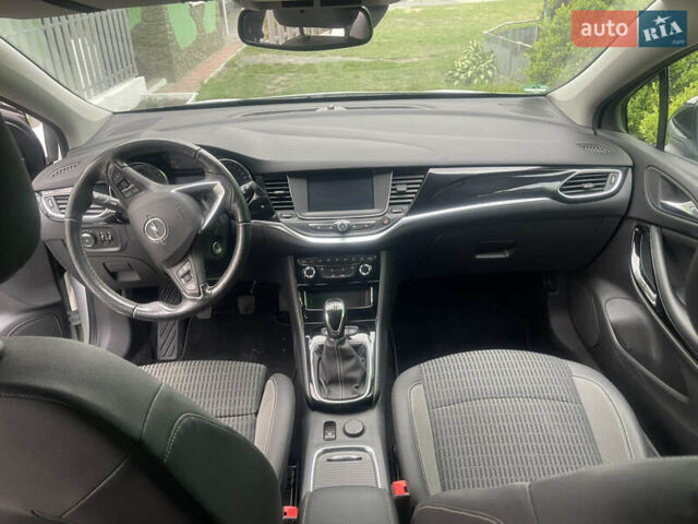 Белый Опель Астра, объемом двигателя 1.5 л и пробегом 140 тыс. км за 14200 $, фото 4 на Automoto.ua