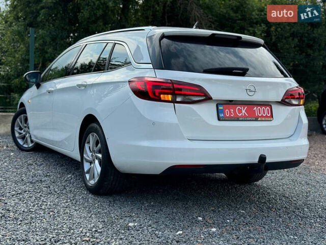 Білий Опель Астра, об'ємом двигуна 1.5 л та пробігом 180 тис. км за 13999 $, фото 19 на Automoto.ua
