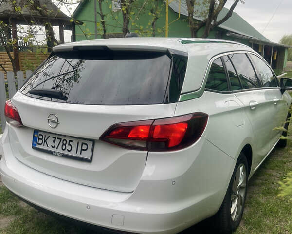 Белый Опель Астра, объемом двигателя 1.5 л и пробегом 140 тыс. км за 14200 $, фото 1 на Automoto.ua