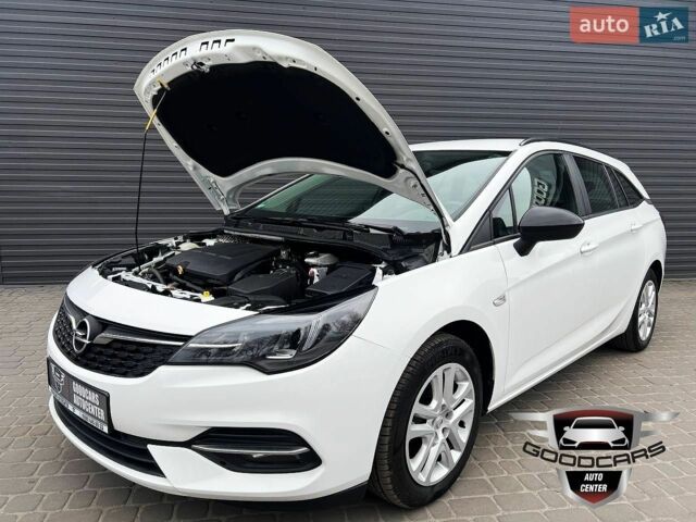 Белый Опель Астра, объемом двигателя 1.5 л и пробегом 163 тыс. км за 12000 $, фото 8 на Automoto.ua