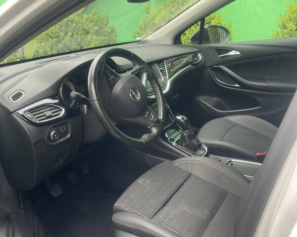 Белый Опель Астра, объемом двигателя 1.5 л и пробегом 140 тыс. км за 14200 $, фото 3 на Automoto.ua