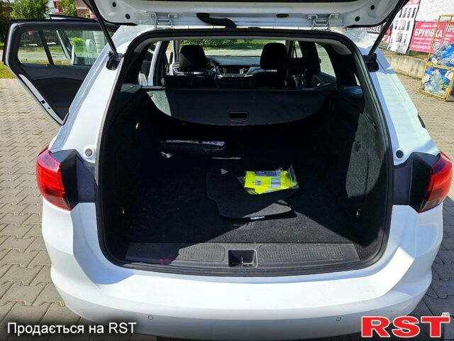 Белый Опель Астра, объемом двигателя 1.5 л и пробегом 100 тыс. км за 14500 $, фото 4 на Automoto.ua