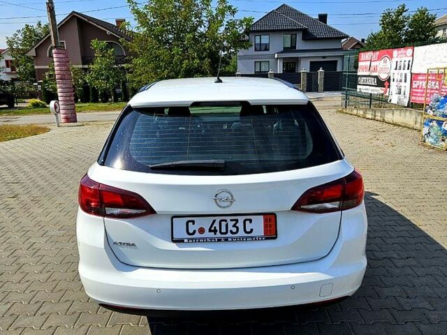 Белый Опель Астра, объемом двигателя 1.5 л и пробегом 100 тыс. км за 14500 $, фото 2 на Automoto.ua