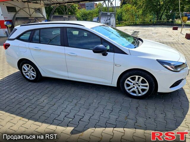 Белый Опель Астра, объемом двигателя 1.5 л и пробегом 100 тыс. км за 14500 $, фото 1 на Automoto.ua