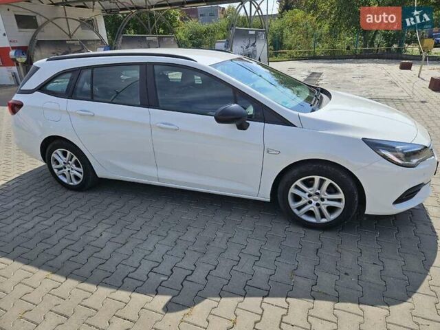 Белый Опель Астра, объемом двигателя 1.5 л и пробегом 100 тыс. км за 14500 $, фото 1 на Automoto.ua