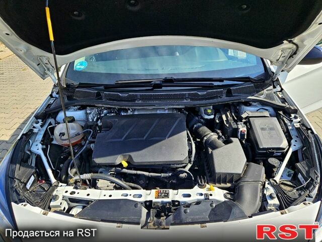 Белый Опель Астра, объемом двигателя 1.5 л и пробегом 100 тыс. км за 14500 $, фото 5 на Automoto.ua