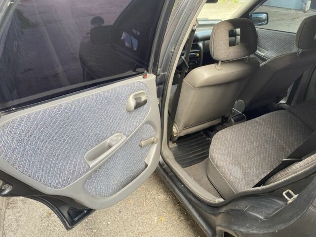 Чорний Опель Астра, об'ємом двигуна 1.6 л та пробігом 256 тис. км за 1400 $, фото 7 на Automoto.ua