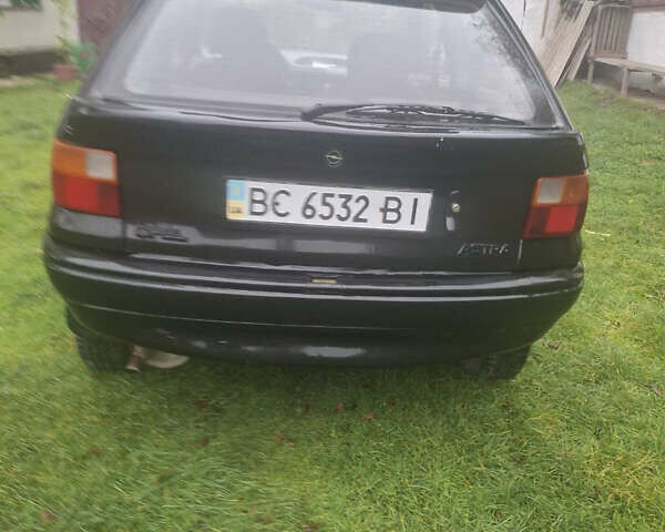 Черный Опель Астра, объемом двигателя 1.4 л и пробегом 350 тыс. км за 1500 $, фото 2 на Automoto.ua