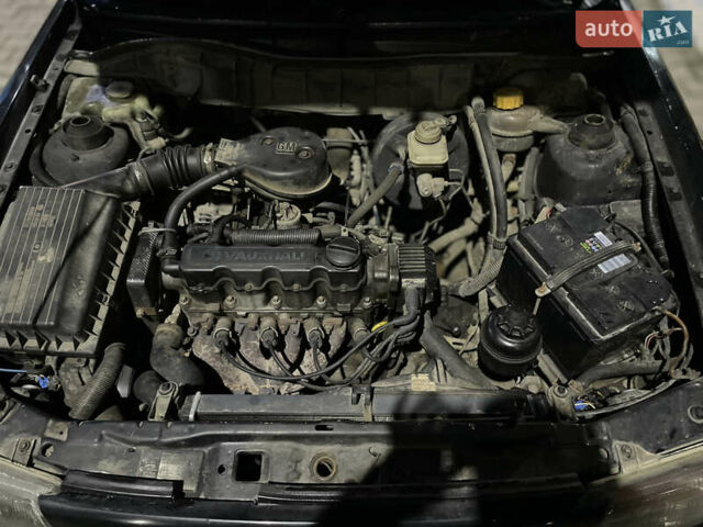 Черный Опель Астра, объемом двигателя 1.6 л и пробегом 300 тыс. км за 1200 $, фото 5 на Automoto.ua