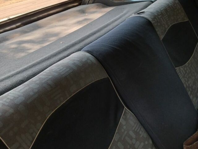 Черный Опель Астра, объемом двигателя 1.4 л и пробегом 280 тыс. км за 1100 $, фото 3 на Automoto.ua