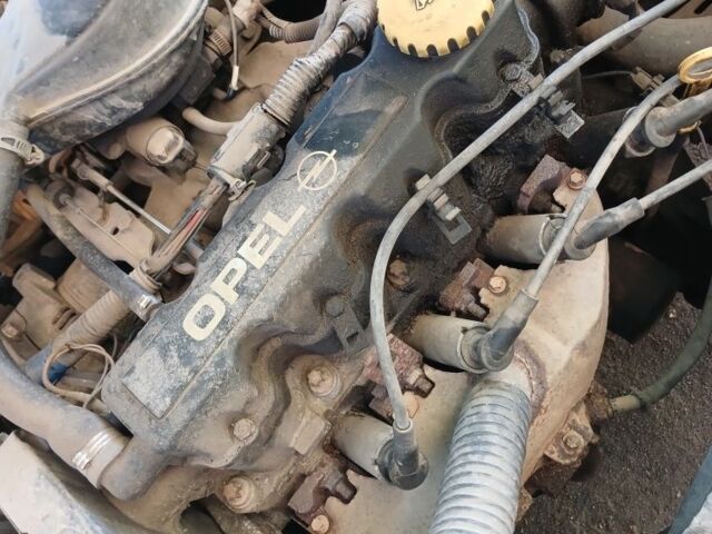 Черный Опель Астра, объемом двигателя 1.4 л и пробегом 280 тыс. км за 1100 $, фото 6 на Automoto.ua