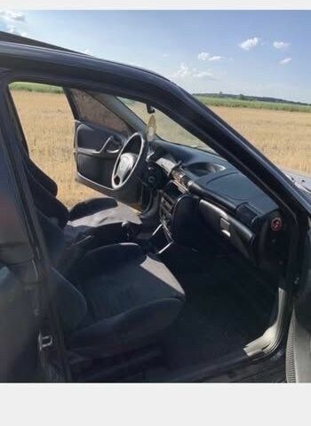 Чорний Опель Астра, об'ємом двигуна 1.6 л та пробігом 340 тис. км за 2000 $, фото 3 на Automoto.ua