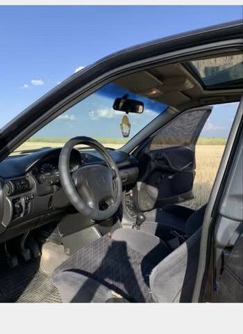 Чорний Опель Астра, об'ємом двигуна 1.6 л та пробігом 340 тис. км за 2000 $, фото 5 на Automoto.ua