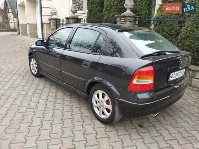 Черный Опель Астра, объемом двигателя 1.6 л и пробегом 246 тыс. км за 3700 $, фото 9 на Automoto.ua