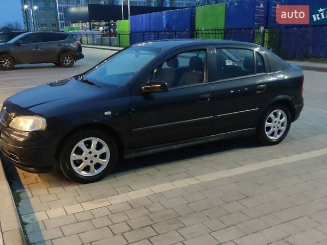 Черный Опель Астра, объемом двигателя 1.6 л и пробегом 246 тыс. км за 3700 $, фото 5 на Automoto.ua