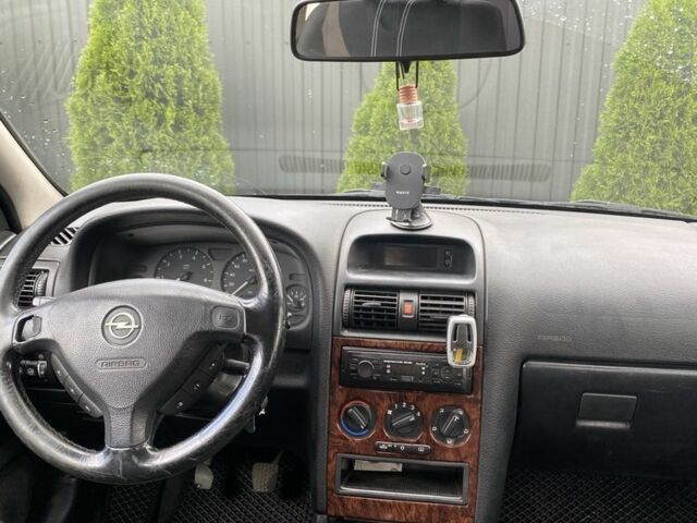 Черный Опель Астра, объемом двигателя 1.6 л и пробегом 276 тыс. км за 2500 $, фото 4 на Automoto.ua