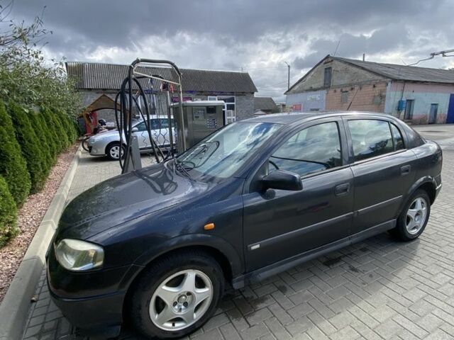 Черный Опель Астра, объемом двигателя 1.6 л и пробегом 276 тыс. км за 2500 $, фото 2 на Automoto.ua