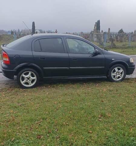 Черный Опель Астра, объемом двигателя 1.6 л и пробегом 171 тыс. км за 2199 $, фото 7 на Automoto.ua