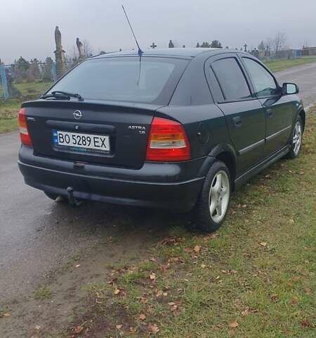 Черный Опель Астра, объемом двигателя 1.6 л и пробегом 171 тыс. км за 2199 $, фото 6 на Automoto.ua
