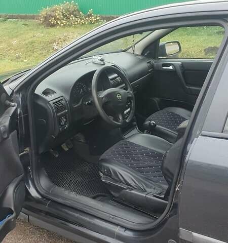 Черный Опель Астра, объемом двигателя 1.6 л и пробегом 171 тыс. км за 2199 $, фото 12 на Automoto.ua