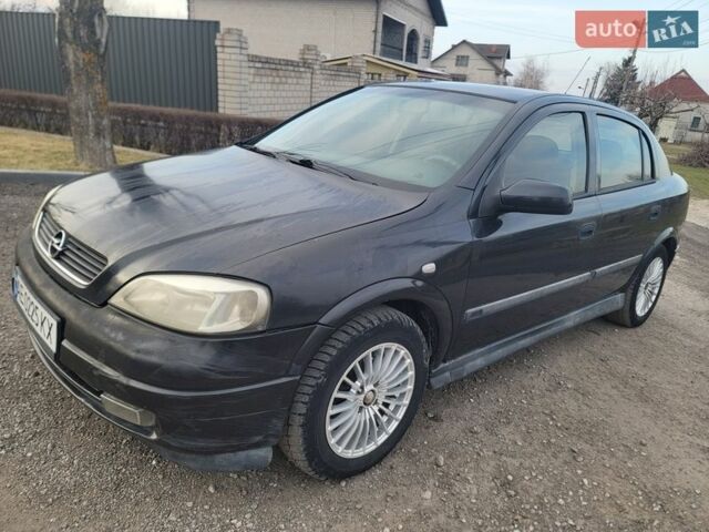 Черный Опель Астра, объемом двигателя 1.6 л и пробегом 220 тыс. км за 2600 $, фото 2 на Automoto.ua