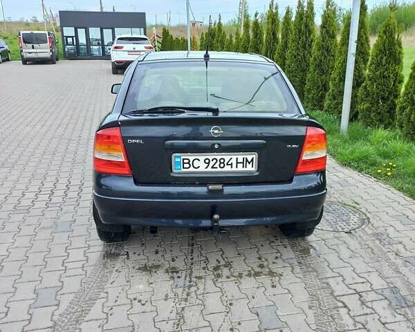 Черный Опель Астра, объемом двигателя 2 л и пробегом 300 тыс. км за 2200 $, фото 3 на Automoto.ua