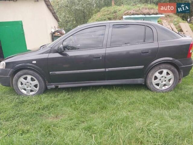 Черный Опель Астра, объемом двигателя 1.8 л и пробегом 249 тыс. км за 2200 $, фото 6 на Automoto.ua