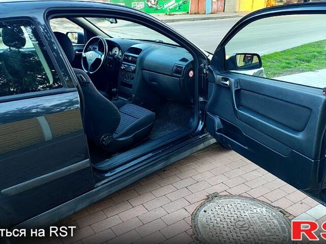 Черный Опель Астра, объемом двигателя 2 л и пробегом 260 тыс. км за 2450 $, фото 9 на Automoto.ua