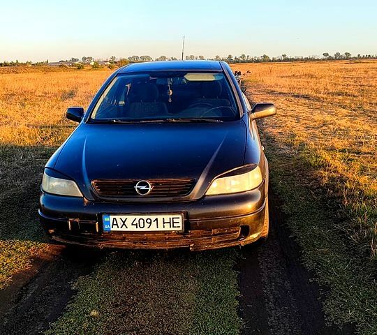 Черный Опель Астра, объемом двигателя 1.6 л и пробегом 330 тыс. км за 2000 $, фото 4 на Automoto.ua