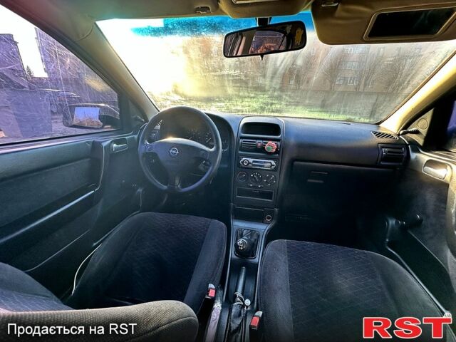 Чорний Опель Астра, об'ємом двигуна 1.4 л та пробігом 245 тис. км за 2700 $, фото 5 на Automoto.ua
