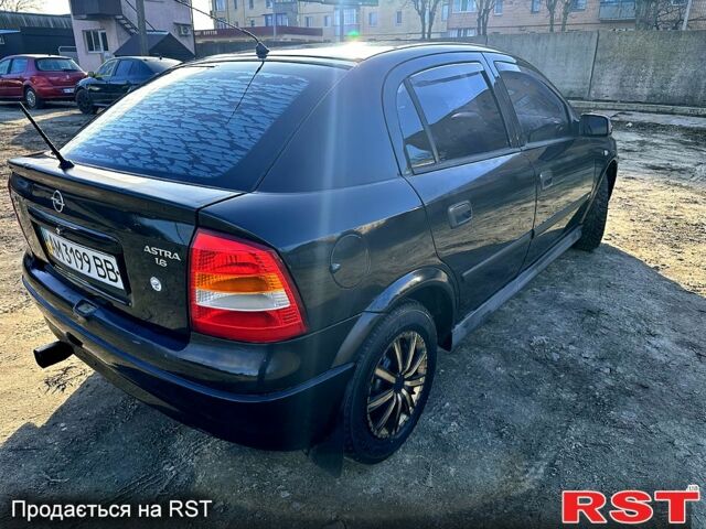 Чорний Опель Астра, об'ємом двигуна 1.4 л та пробігом 245 тис. км за 2700 $, фото 4 на Automoto.ua