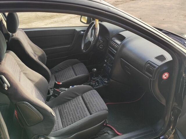 Черный Опель Астра, объемом двигателя 2 л и пробегом 299 тыс. км за 2141 $, фото 5 на Automoto.ua