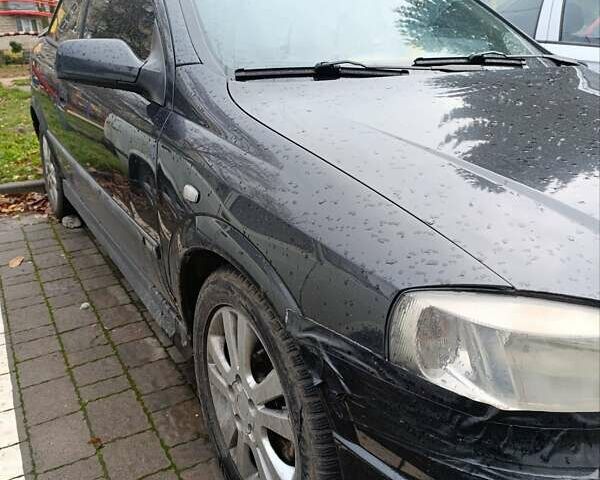 Черный Опель Астра, объемом двигателя 2 л и пробегом 311 тыс. км за 1650 $, фото 1 на Automoto.ua