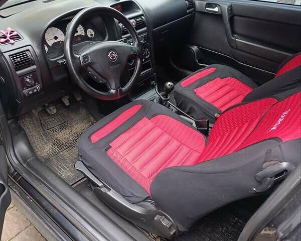 Черный Опель Астра, объемом двигателя 2 л и пробегом 311 тыс. км за 1650 $, фото 6 на Automoto.ua