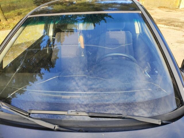 Черный Опель Астра, объемом двигателя 2 л и пробегом 299 тыс. км за 2141 $, фото 4 на Automoto.ua