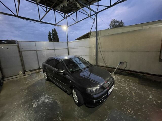 Черный Опель Астра, объемом двигателя 2 л и пробегом 450 тыс. км за 2500 $, фото 2 на Automoto.ua