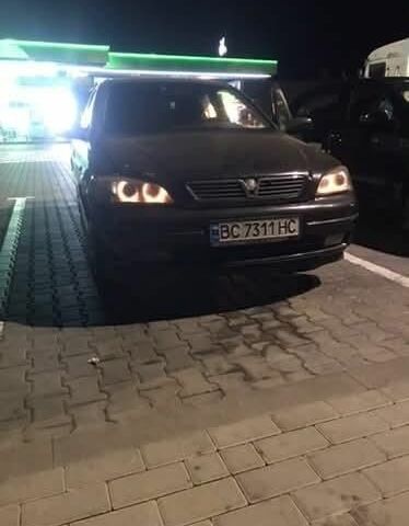 Черный Опель Астра, объемом двигателя 1.8 л и пробегом 230 тыс. км за 2400 $, фото 3 на Automoto.ua