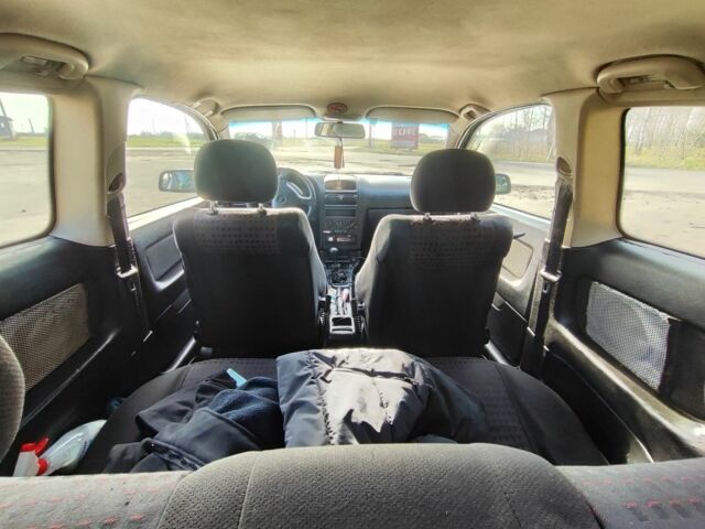 Черный Опель Астра, объемом двигателя 2 л и пробегом 299 тыс. км за 2141 $, фото 6 на Automoto.ua