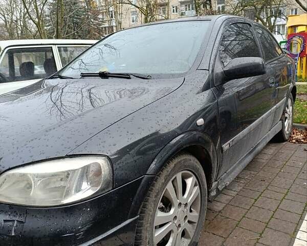 Черный Опель Астра, объемом двигателя 2 л и пробегом 311 тыс. км за 1650 $, фото 2 на Automoto.ua
