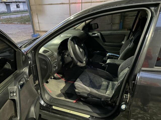 Черный Опель Астра, объемом двигателя 2 л и пробегом 450 тыс. км за 2500 $, фото 4 на Automoto.ua