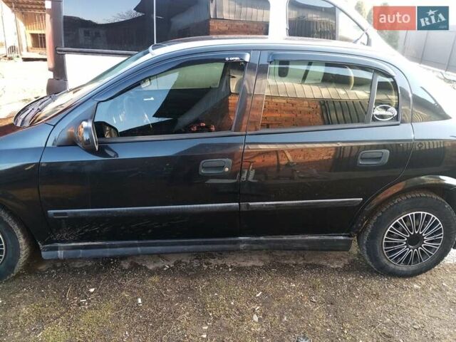 Черный Опель Астра, объемом двигателя 1.7 л и пробегом 413 тыс. км за 2400 $, фото 5 на Automoto.ua